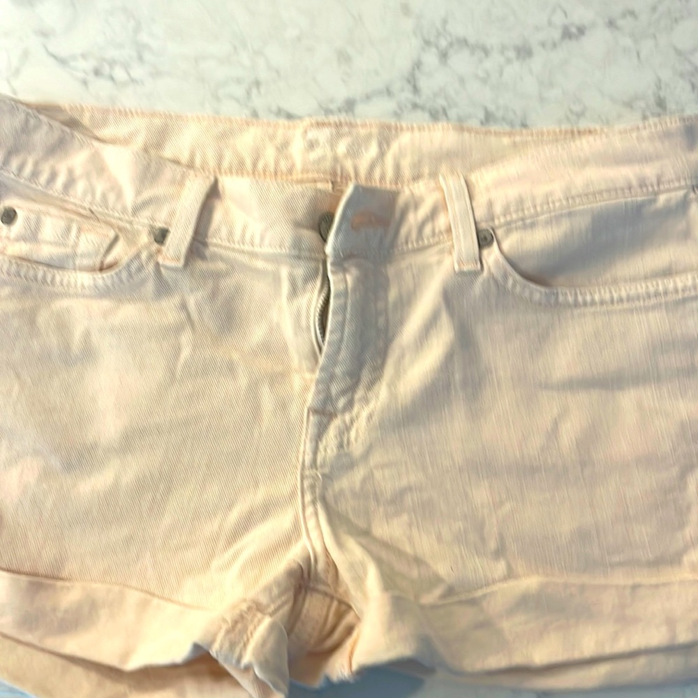 7 For All Man Kind woman’s shorts. Size 29. Color is cream to very light pink.